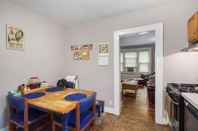 1019/1021 N Michigan Ave, Howell, MI 48843 - dining area with radiator heating unit and baseboards