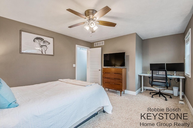 881 Cobblestone Way Dr SE, Byron Center, MI 49315 - carpeted bedroom featuring baseboards, ceiling fan, and a desk