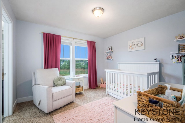 881 Cobblestone Way Dr SE, Byron Center, MI 49315 - bedroom featuring light colored carpet, baseboards, and a crib