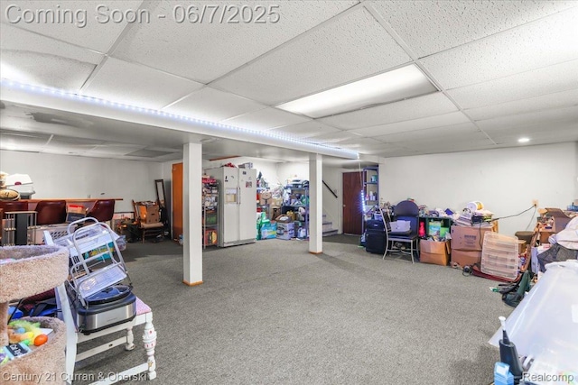 6958 Whitby St, Garden City, MI 48135 - finished below grade area featuring a drop ceiling, white fridge with ice dispenser, carpet, and stairs