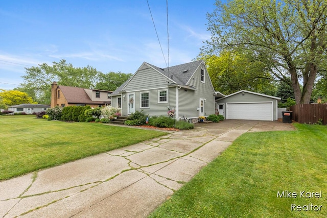 3674 Barker St, Hudsonville, MI 49426 - bungalow-style home featuring an outbuilding and driveway