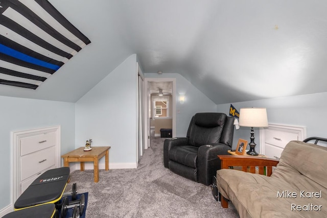 3674 Barker St, Hudsonville, MI 49426 - carpeted living area featuring vaulted ceiling and baseboards