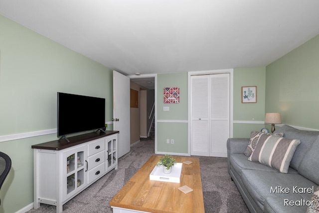 3674 Barker St, Hudsonville, MI 49426 - carpeted living area featuring baseboards
