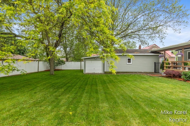 3674 Barker St, Hudsonville, MI 49426 - view of yard featuring a garage