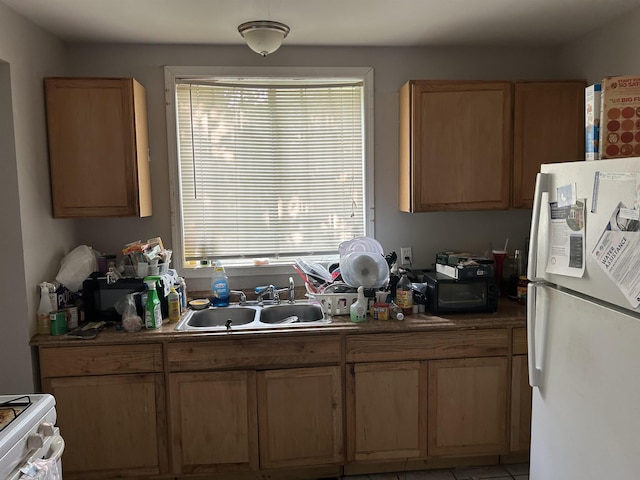 2318 Reid St, Flint, MI 48503 - kitchen with white appliances and a sink