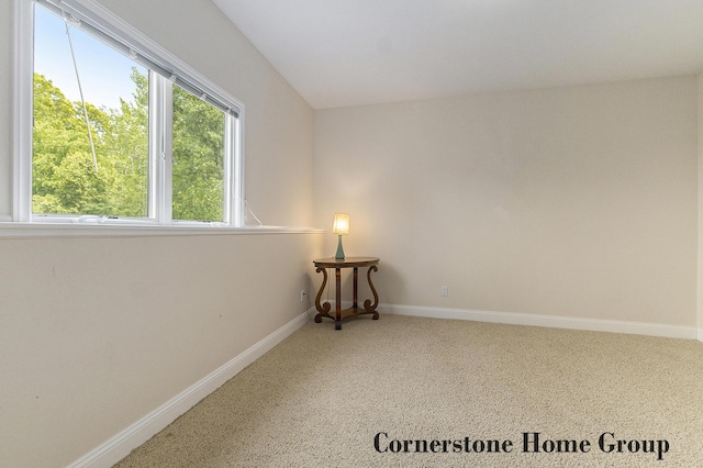 5273 S Silverstone Dr NE, Comstock Park, MI 49321 - carpeted spare room with baseboards