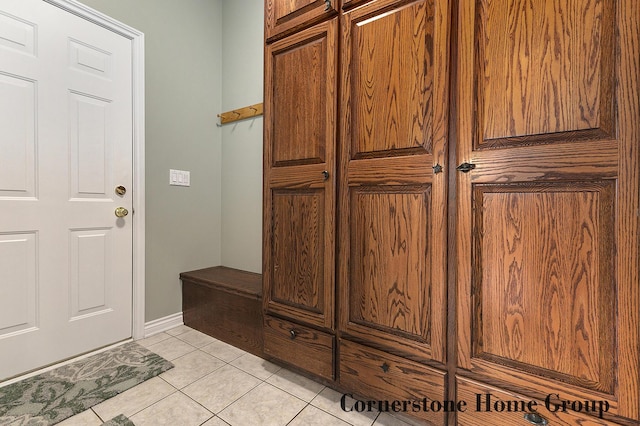 5273 S Silverstone Dr NE, Comstock Park, MI 49321 - mudroom with light tile patterned floors and baseboards