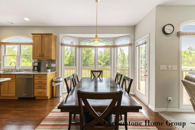 5273 S Silverstone Dr NE, Comstock Park, MI 49321 - dining area featuring dark wood-style flooring, recessed lighting, and baseboards