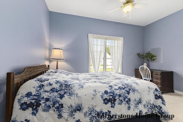 5273 S Silverstone Dr NE, Comstock Park, MI 49321 - carpeted bedroom with ceiling fan and baseboards