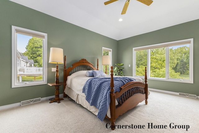 5273 S Silverstone Dr NE, Comstock Park, MI 49321 - bedroom featuring multiple windows, baseboards, and carpet flooring