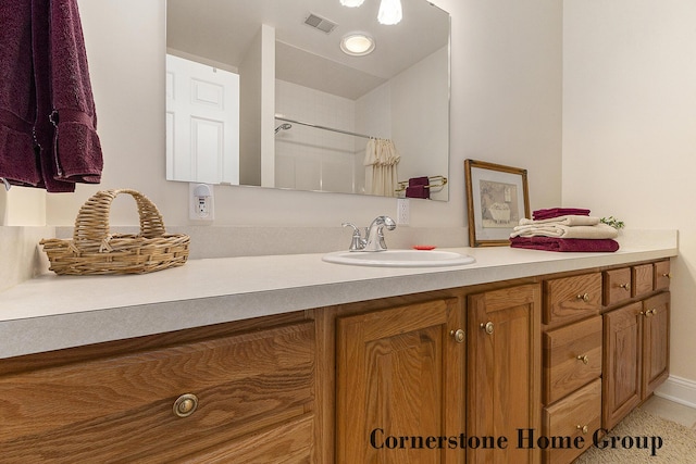 5273 S Silverstone Dr NE, Comstock Park, MI 49321 - bathroom featuring vanity, a shower with shower curtain, and recessed lighting