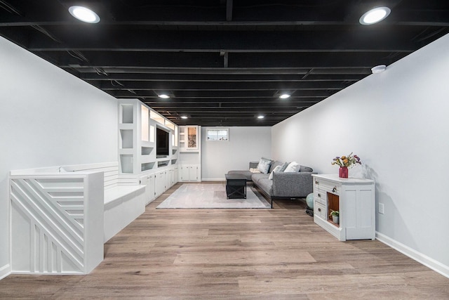 2016 Engleside Dr SE, Grand Rapids, MI 49546 - living area with light wood-type flooring and baseboards