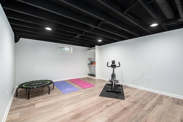 2016 Engleside Dr SE, Grand Rapids, MI 49546 - workout room with wood finished floors and baseboards