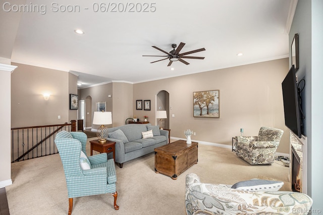 825 Mcintosh Ct, Oakland, MI 48363 - carpeted living room with arched walkways, a ceiling fan, ornamental molding, and recessed lighting