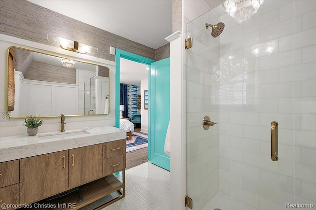 600 Wolverine Dr, Walled Lake, MI 48390 - ensuite bathroom featuring a shower stall, vanity, and tile patterned floors