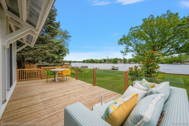 600 Wolverine Dr, Walled Lake, MI 48390 - wooden deck featuring a water view, an outdoor living space, a yard, and outdoor dining area
