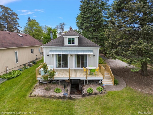 600 Wolverine Dr, Walled Lake, MI 48390 - rear view of property featuring a yard, a deck, roof with shingles, and stairs