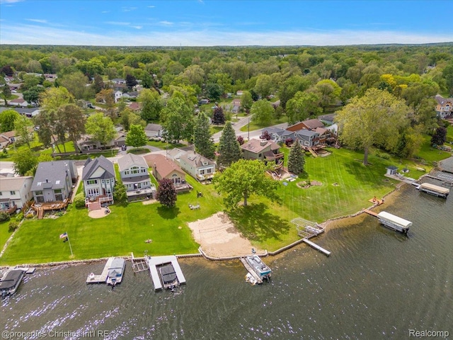 600 Wolverine Dr, Walled Lake, MI 48390 - aerial view of residential area with a nearby body of water and a heavily wooded area