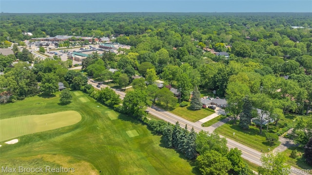 6695 Lahser Rd, Bloomfield Hills, MI 48301 - aerial view of a golf club and a heavily wooded area