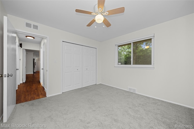 6695 Lahser Rd, Bloomfield Hills, MI 48301 - unfurnished bedroom with carpet flooring, a closet, and a ceiling fan