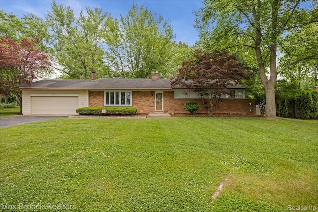 6695 Lahser Rd, Bloomfield Hills, MI 48301 - view of front of property featuring an attached garage, asphalt driveway, a front yard, and a chimney