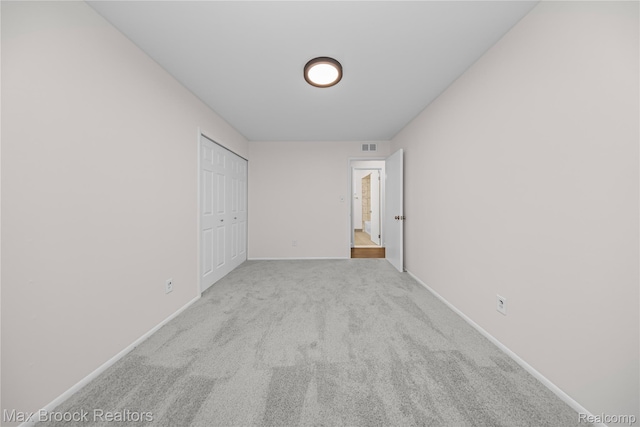 6695 Lahser Rd, Bloomfield Hills, MI 48301 - unfurnished bedroom featuring carpet flooring and a closet