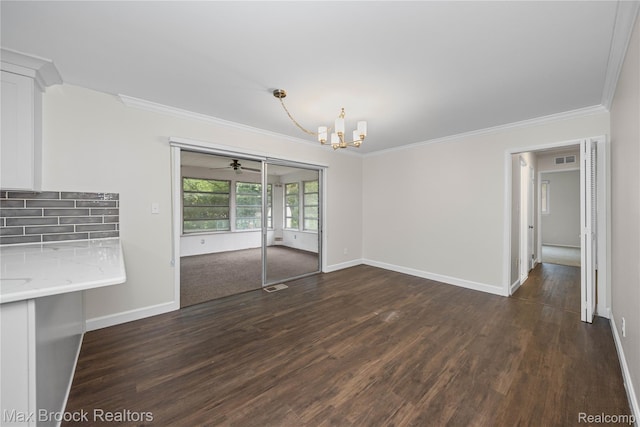 6695 Lahser Rd, Bloomfield Hills, MI 48301 - unfurnished dining area featuring a chandelier, dark wood-style flooring, and ornamental molding