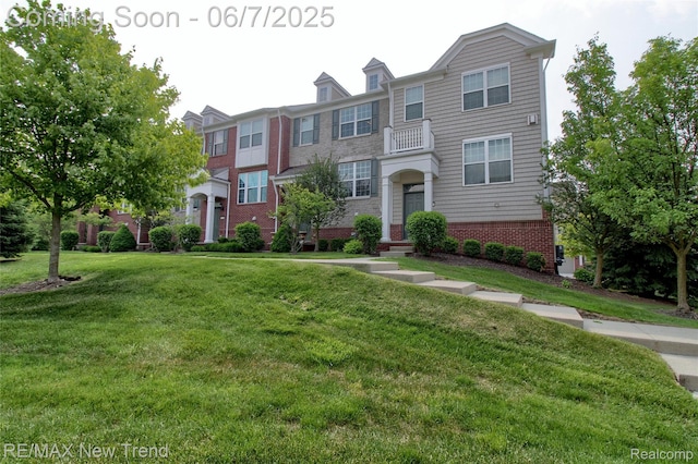 44509 Ellery Ln, Novi, MI 48377 - multi unit property with brick siding and a front lawn