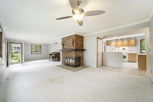 2800 Kimberley Rd, Ann Arbor, MI 48104 - unfurnished living room featuring ornamental molding, a ceiling fan, baseboards, light colored carpet, and a brick fireplace