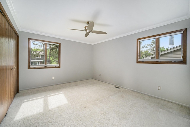 2800 Kimberley Rd, Ann Arbor, MI 48104 - unfurnished bedroom with carpet floors, crown molding, baseboards, and a closet