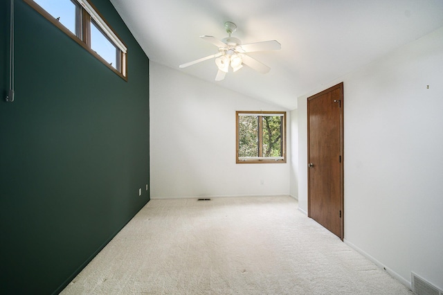 2800 Kimberley Rd, Ann Arbor, MI 48104 - carpeted spare room featuring vaulted ceiling, ceiling fan, and baseboards