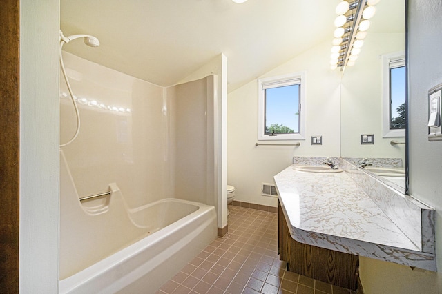 2800 Kimberley Rd, Ann Arbor, MI 48104 - full bath featuring lofted ceiling, toilet, tile patterned flooring, vanity, and shower / bathtub combination