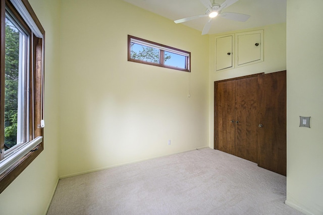 2800 Kimberley Rd, Ann Arbor, MI 48104 - unfurnished bedroom with carpet, a closet, and ceiling fan