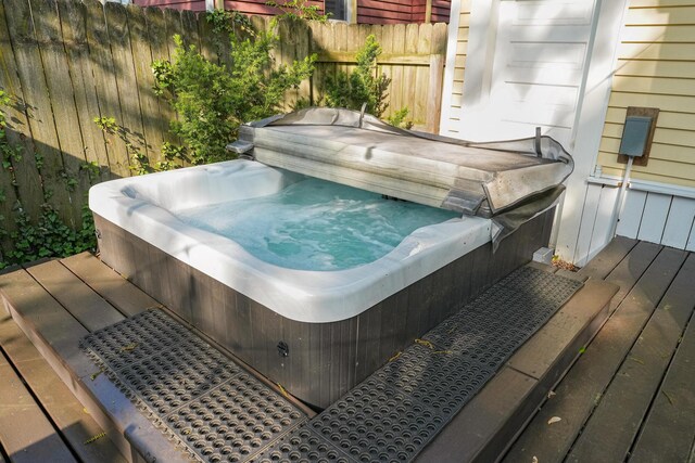 1118 Main St, Saint Joseph, MI 49085 - wooden terrace featuring a hot tub