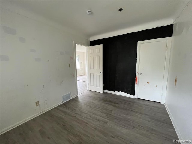 21731 Nevada Ave, Eastpointe, MI 48021 - spare room featuring wood finished floors and a smoke detector