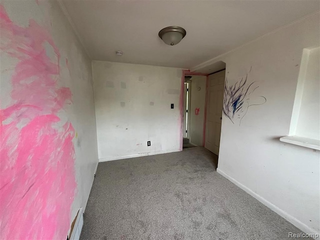 21731 Nevada Ave, Eastpointe, MI 48021 - carpeted empty room with baseboards and a smoke detector