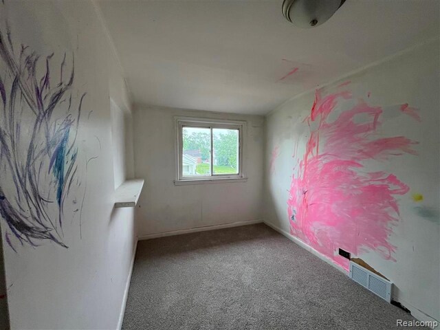 21731 Nevada Ave, Eastpointe, MI 48021 - spare room featuring carpet floors and baseboards