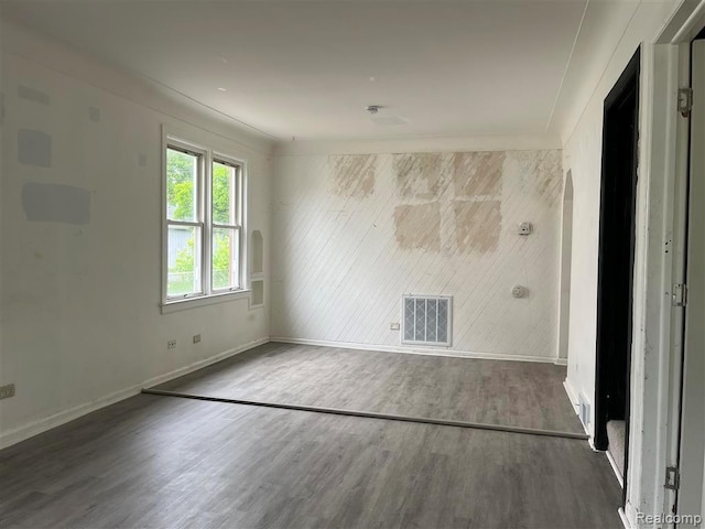 21731 Nevada Ave, Eastpointe, MI 48021 - empty room with wood finished floors and baseboards