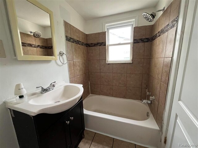 21731 Nevada Ave, Eastpointe, MI 48021 - bathroom featuring vanity, shower / bathtub combination, and tile patterned floors