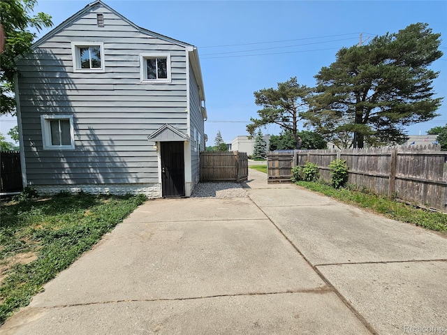 1073 W Bristol Rd, Grand Blanc, MI 48507 - view of property exterior featuring a patio