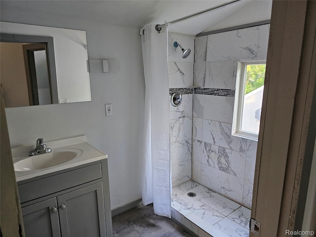 1073 W Bristol Rd, Grand Blanc, MI 48507 - full bath with a stall shower, vanity, and lofted ceiling