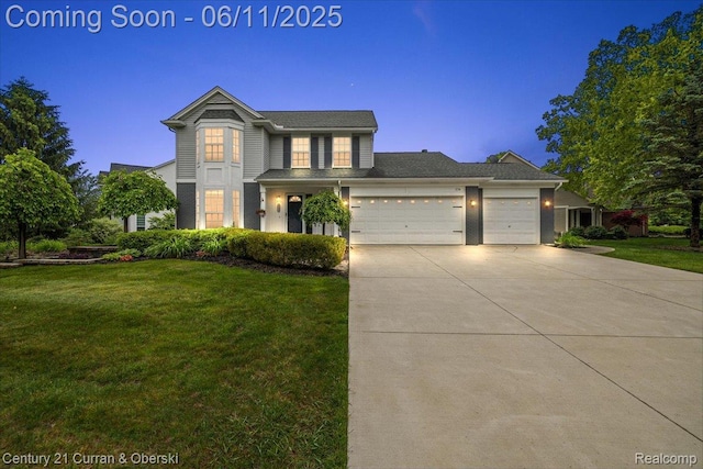 1134 Chestnut Ln, South Lyon, MI 48178 - traditional-style house featuring a garage, driveway, and a front yard