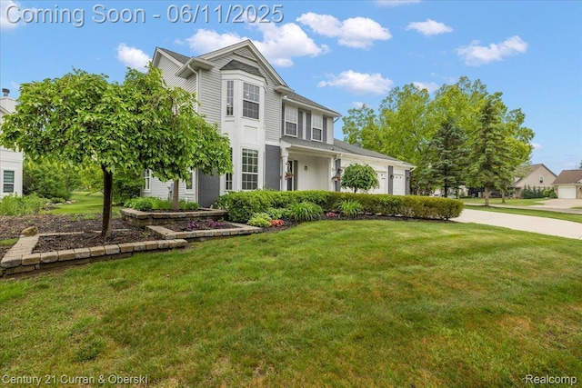 1134 Chestnut Ln, South Lyon, MI 48178 - view of front of house with a front yard, a garage, and concrete driveway