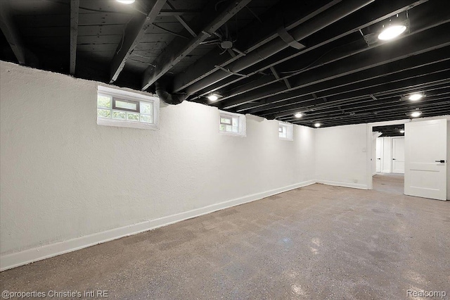 17155 Wisconsin St, Detroit, MI 48221 - below grade area with baseboards and a textured wall