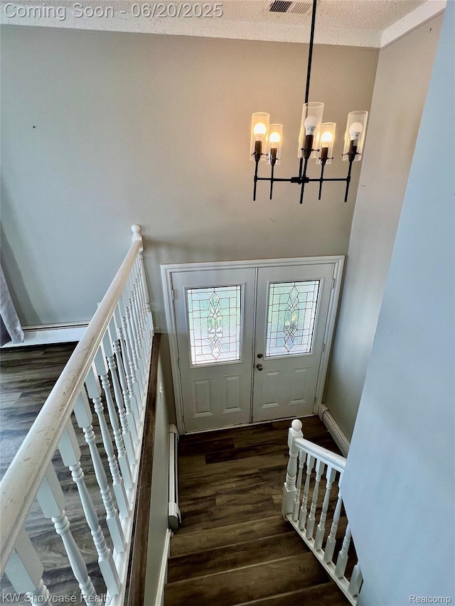 1869 Union Lake Rd, Commerce Twp, MI 48382 - entrance foyer featuring wood finished floors and a chandelier