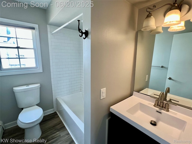 1869 Union Lake Rd, Commerce Twp, MI 48382 - bathroom with vanity, wood finished floors, bathing tub / shower combination, and a baseboard heating unit