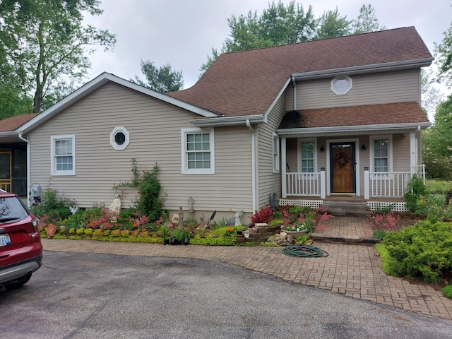 70170 Ironwood Dr, Niles, MI 49120 - view of front of property featuring covered porch and roof with shingles