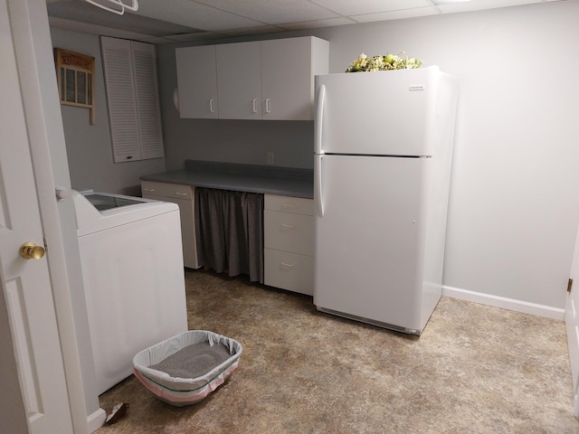 70170 Ironwood Dr, Niles, MI 49120 - kitchen featuring freestanding refrigerator, washer / dryer, a drop ceiling, carpet flooring, and baseboards