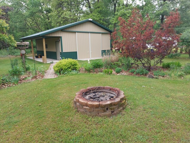 70170 Ironwood Dr, Niles, MI 49120 - view of green lawn with a fire pit