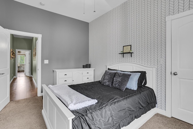 7910 Stony Lake Rd, Jackson, MI 49201 - carpeted bedroom with wallpapered walls and baseboards